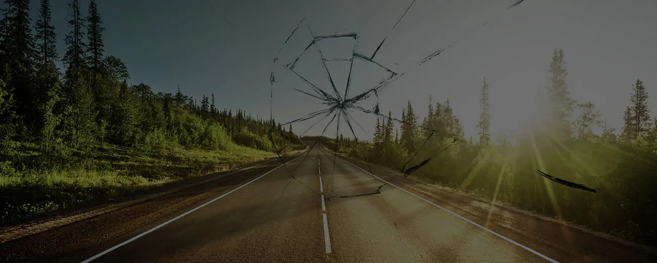 Cracked glass on road