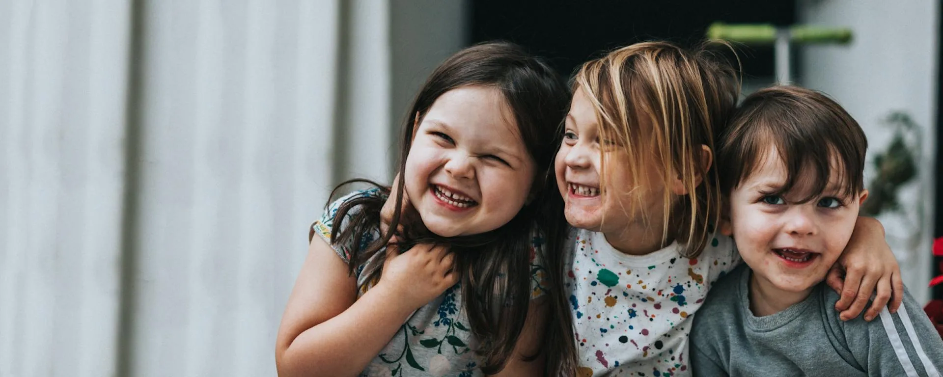 Children hugging csr