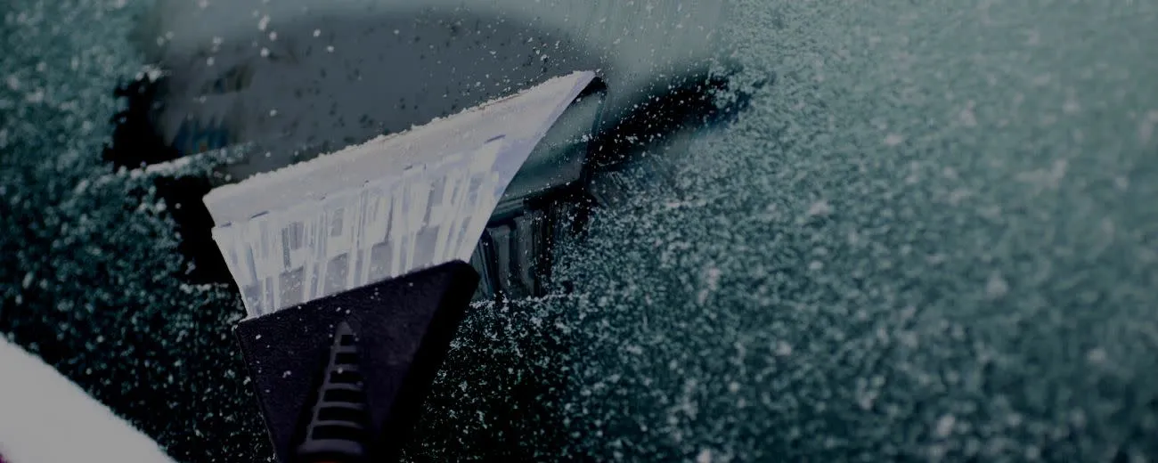ice scraper on windscreen-