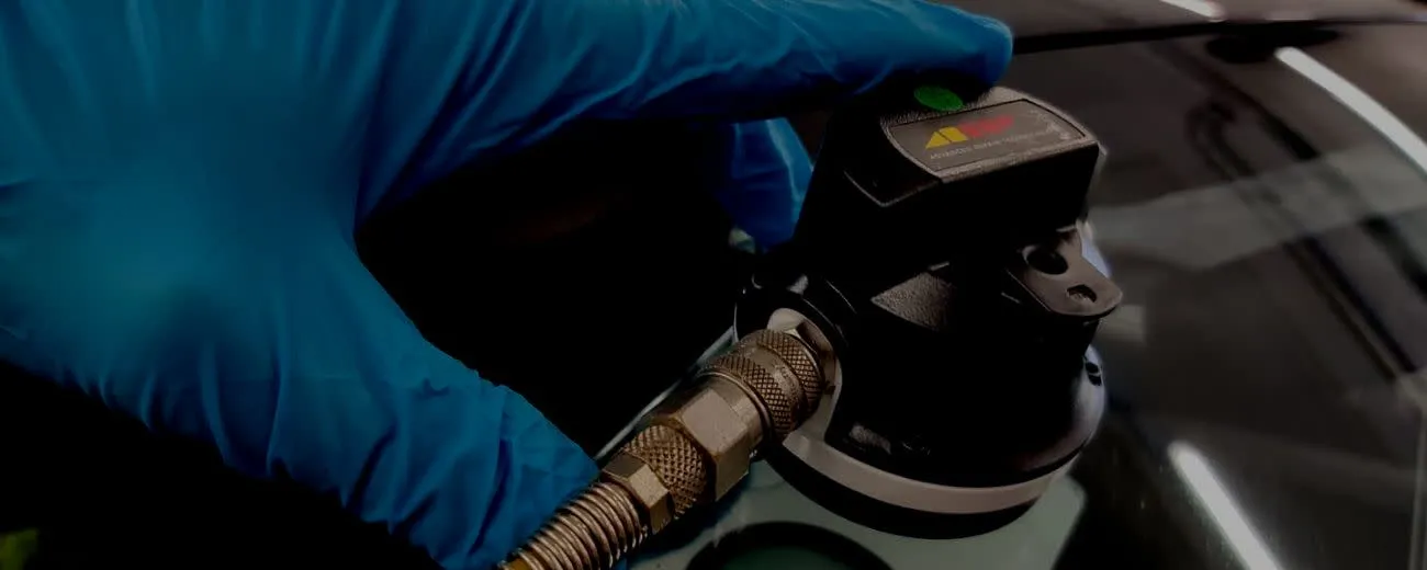 Windscreen repair hand